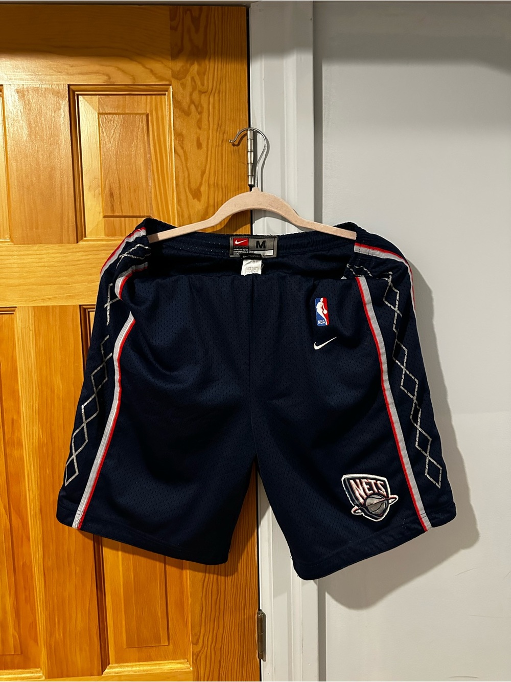 Vintage Nike Men's Brooklyn Nets Basketball Shorts with Red & White Trim